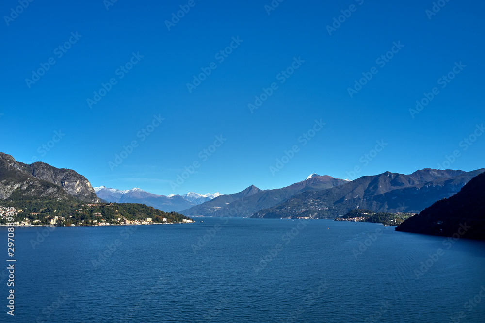 Panoramic top view of Lake Como. Lombardy, Italy. Autumn season. Perfect clear blue sky.