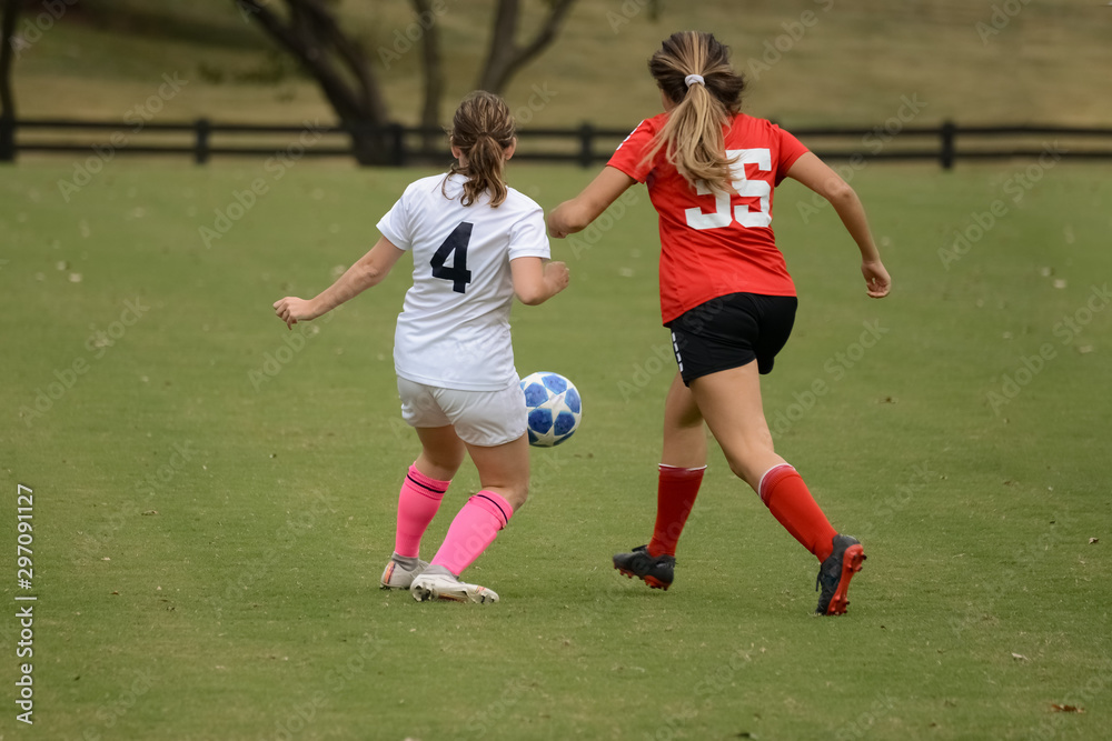 Soccer players of opposing teams Soccer players of opposing teams