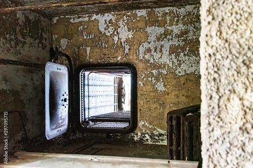 Abandoned autoclave n the ruined hospital buildings at Ellis Island, photo