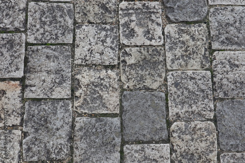 Texture pavé gris en pierre route chaussé en granit
