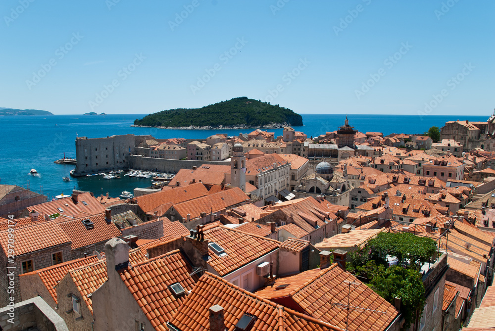 Dubrovnik, Croatia. Aerial view to clock tower, Assumption Cathedral and old harbor