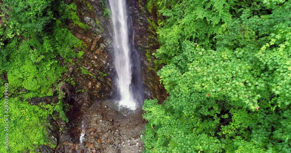 Aerial Close up of waterfall by the cliff 4k nature landscape footage Aerial Close up of waterfall by the cliff 4k nature landscape footage