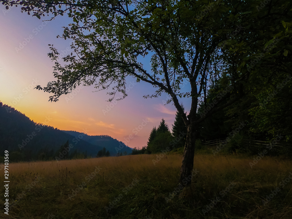 Landscape with Carpathian mountains during the sunset with amazing sunlight