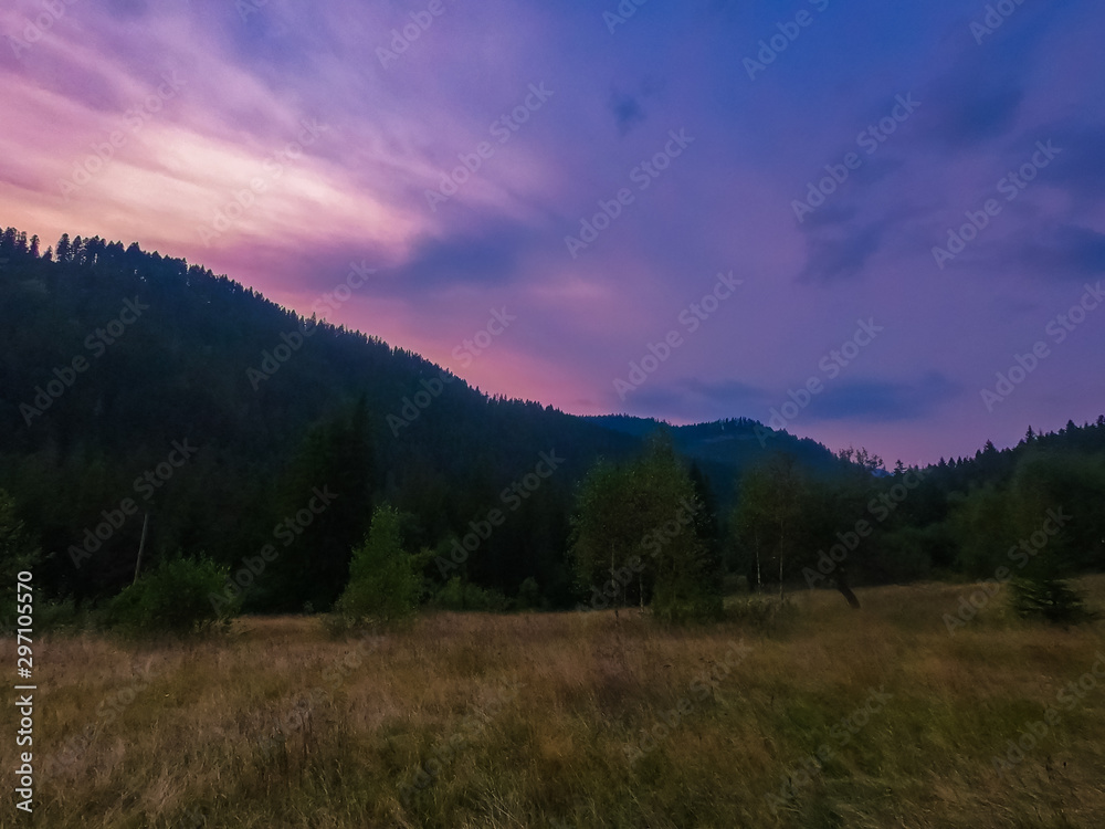 Landscape with Carpathian mountains during the sunset with amazing sunlight