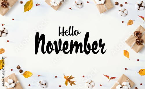 Hello November message with gift boxes with autumn leaves