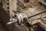 handle of lathe machine and scrap of metal steel