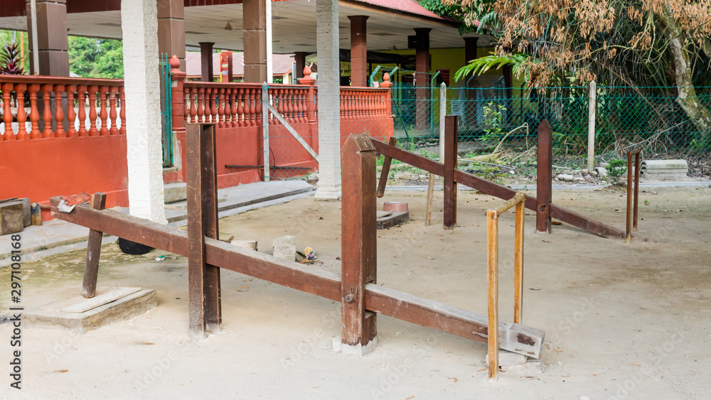 An old traditional wood rice puncher or An old traditional wood rice puncher or