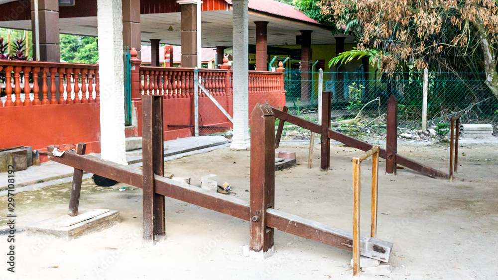 An old traditional wood rice puncher or An old traditional wood rice puncher or