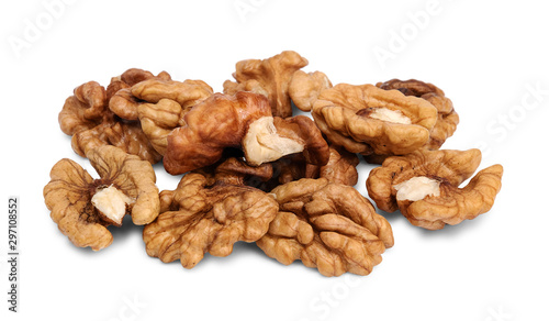 Close up of heap of walnut kernels, isolated on white background.
