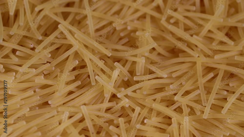 raw shallow vermicelli slowly rotate. background raw shallow vermicelli slowly rotate. background