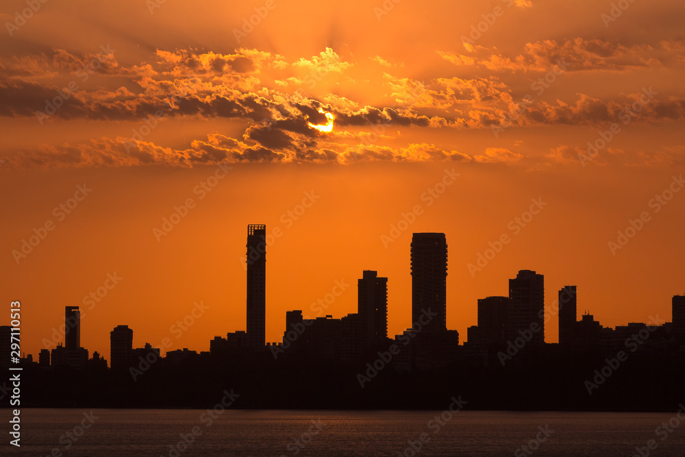 Silhouette shot of Mumbai Skyline at Sunset as seen from Marine Drive