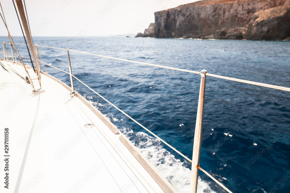 Fototapeta premium White sailing yacht deck with railings and ropes