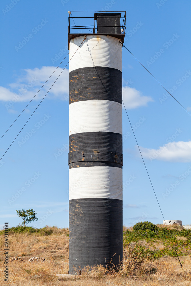 Black and white striped navigational tower