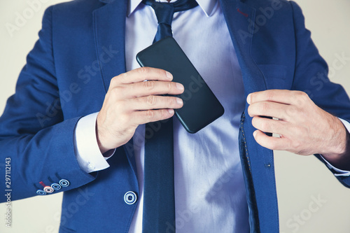 man hand phone in pocket