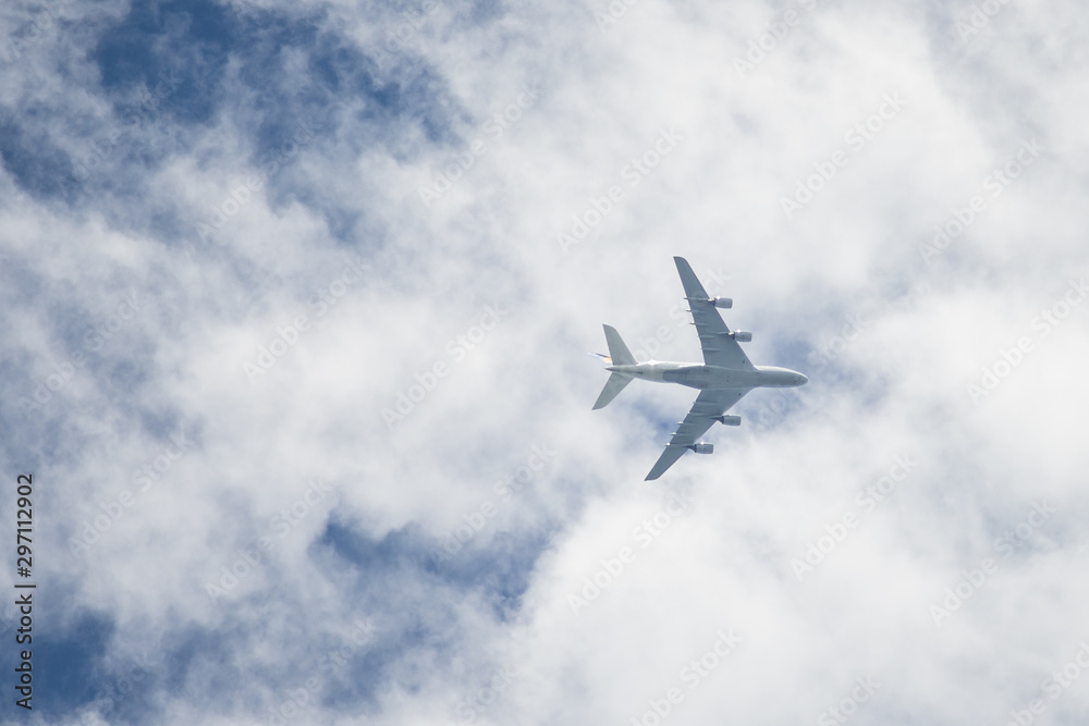 Large four-bladed aircraft, just captured from below. Large four-bladed aircraft, just captured from below.