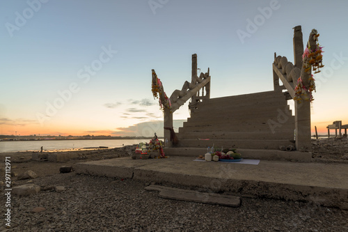 Stairs up of Wat Nongbua/ruins temple that has sunk in the Pa Sak Jolasid Dam for 20 years due to the drought appears. photo