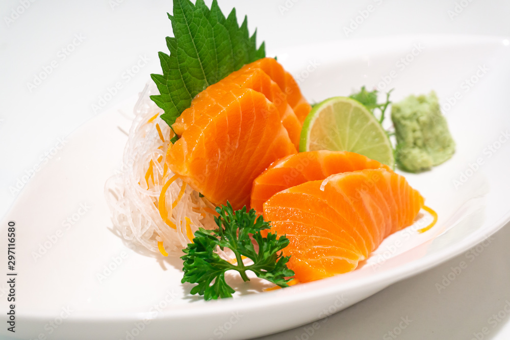 premium salmon sashimi slice on a White Plate,japanese food premium salmon sashimi slice on a White Plate,japanese food