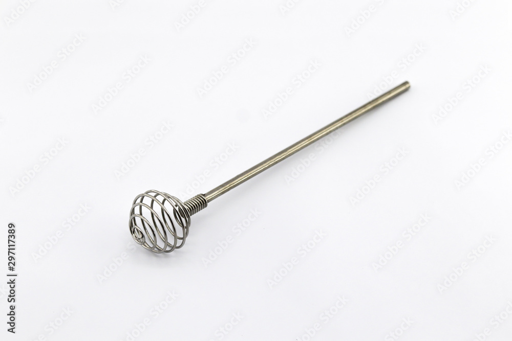 single honey scoop made from stainless steel on white background single honey scoop made from stainless steel on white background
