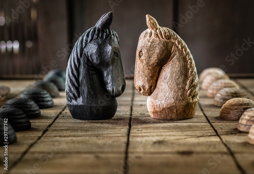Obraz na plátně Battle of Wooden Chess Horse