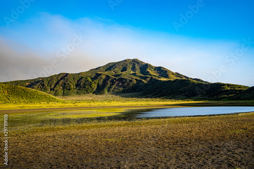 landscape with field and blue sky, Kusasenri, Aso, Kumamoto photo