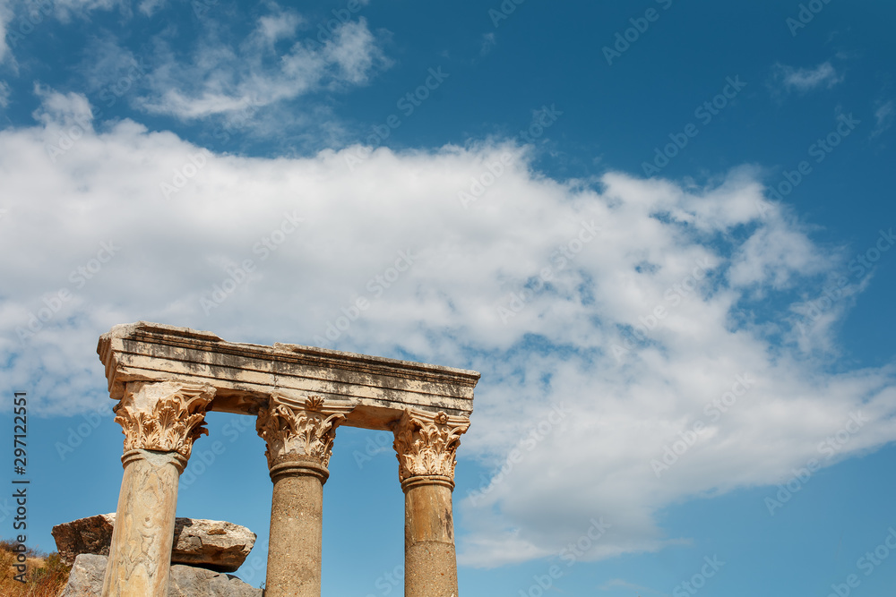 Columns The ruins of the ancient city of Ephesus against the blue sky on a sunny day.