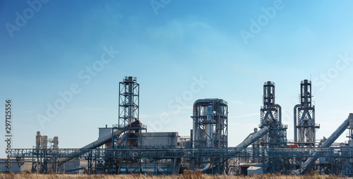 An image of a woodworking plant with various details and structural elements in high quality, including pipes, sewage filters and other metal elements in a complex industrial building.
