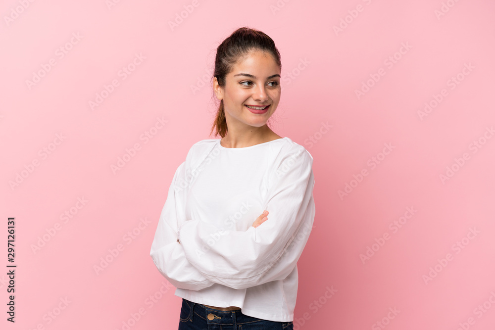 Young brunette girl over isolated pink background with arms crossed and happy Young brunette girl over isolated pink background with arms crossed and happy