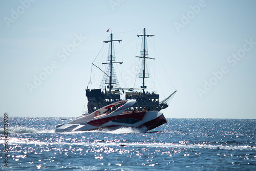 Pirat boat with sport aunch  in the water © Artur Kiselev