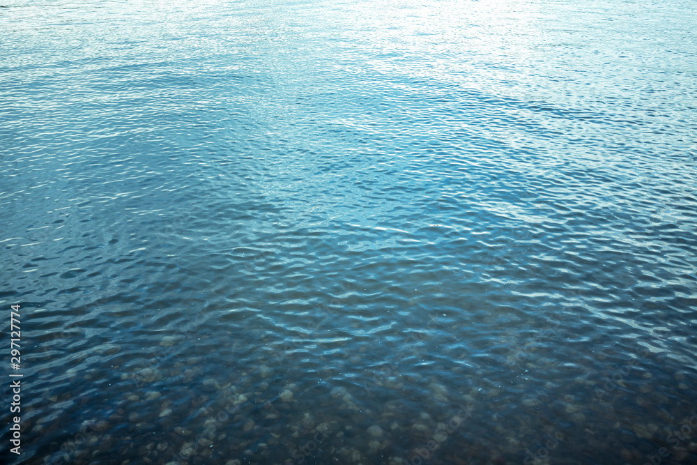 water surface with ripples for backgrounds - obrazy, fototapety, plakaty 