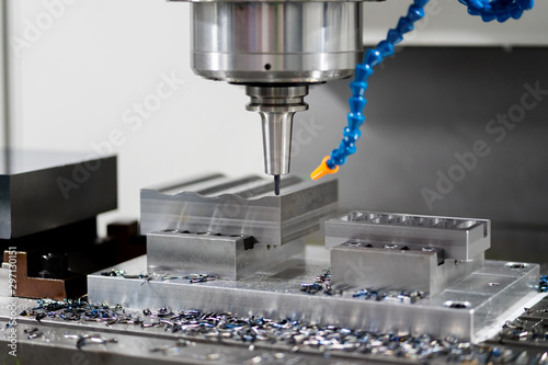 High precision CNC machining center working, operator machining automotive sample part process in the factory