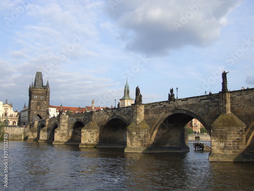 Charles bridge in Prague with water