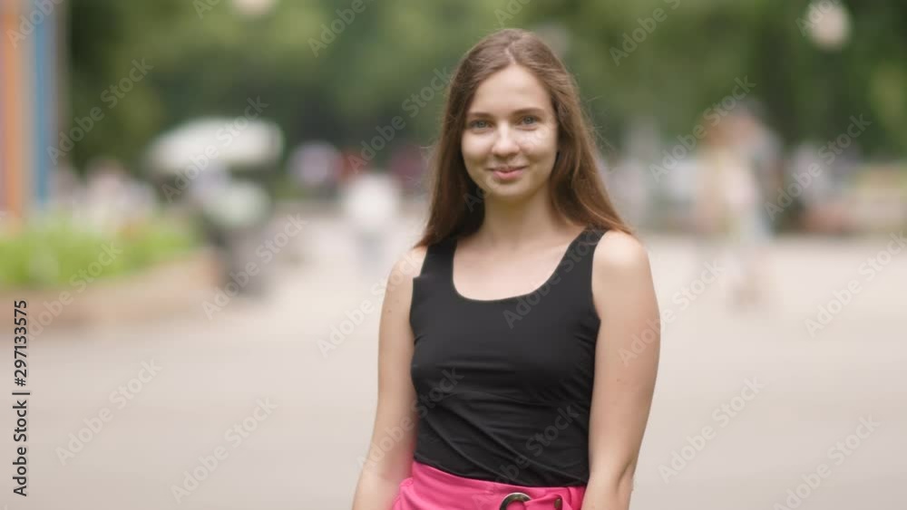 Young Attractive Caucasian Woman Posing In The Park Young Attractive Caucasian Woman Posing In The Park