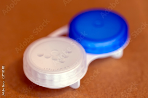 Blue and white contact lens container closed