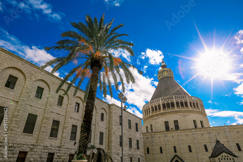 The Chirst Church under the Cloudy Blue Sky with the Palms, Nazareth, Israel photo