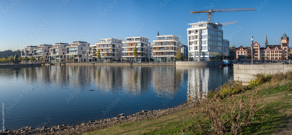 Panorama of the New buildings at the Phönix Lake with the construction site for the office