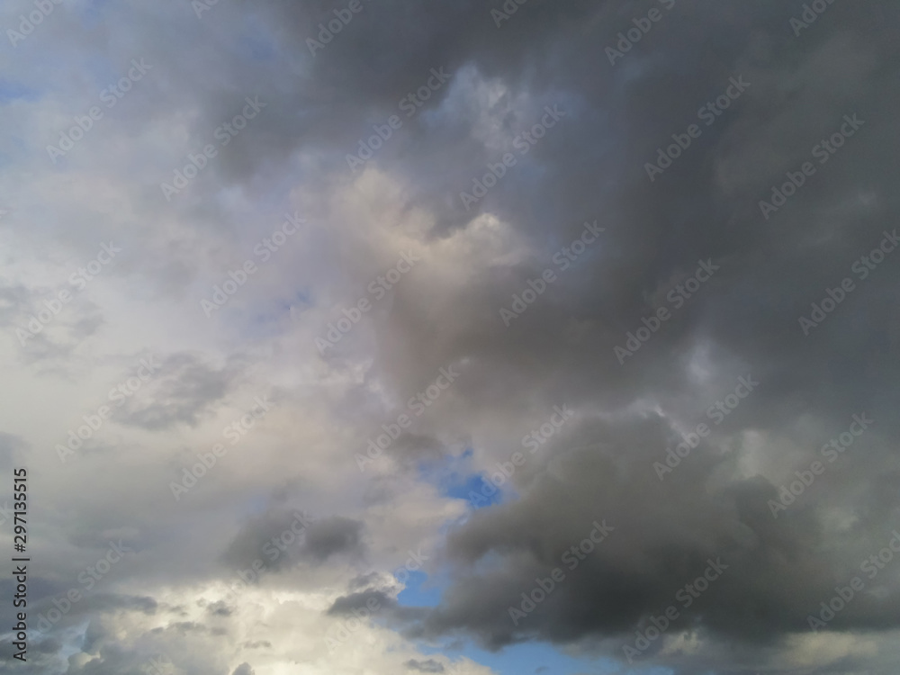 Dramatic cloudy blue sky background.