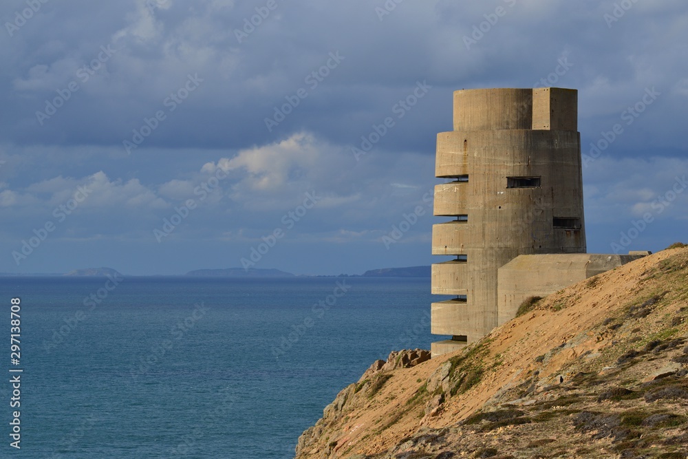 Les Landes, Jersey, U.K. WW2 German bunker overlooks other islands Sark Jethou and Brecqhou.