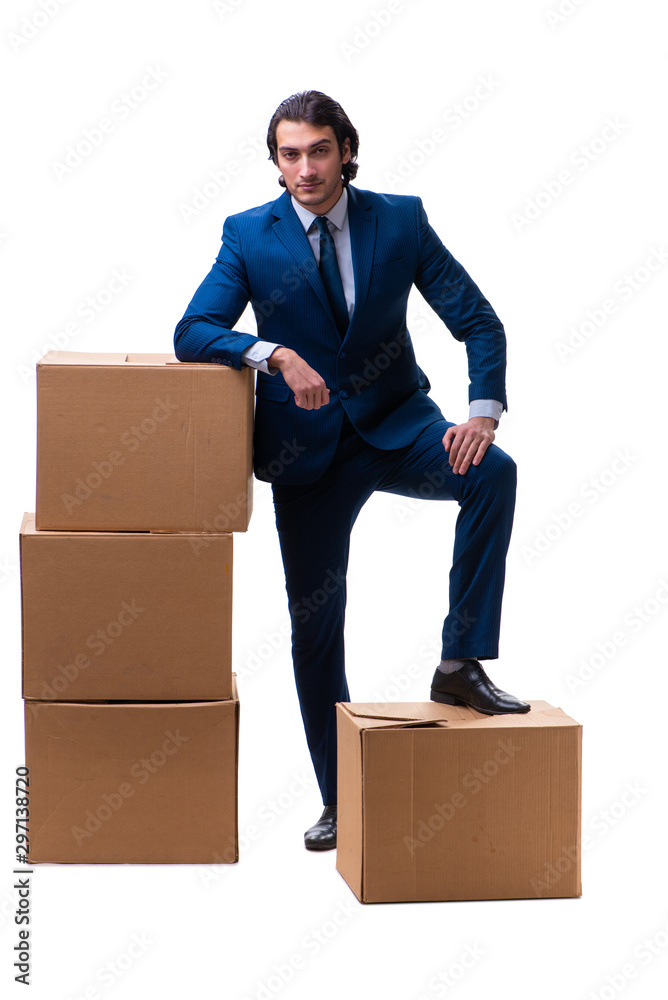 Young male employee with boxes isolated on white Young male employee with boxes isolated on white