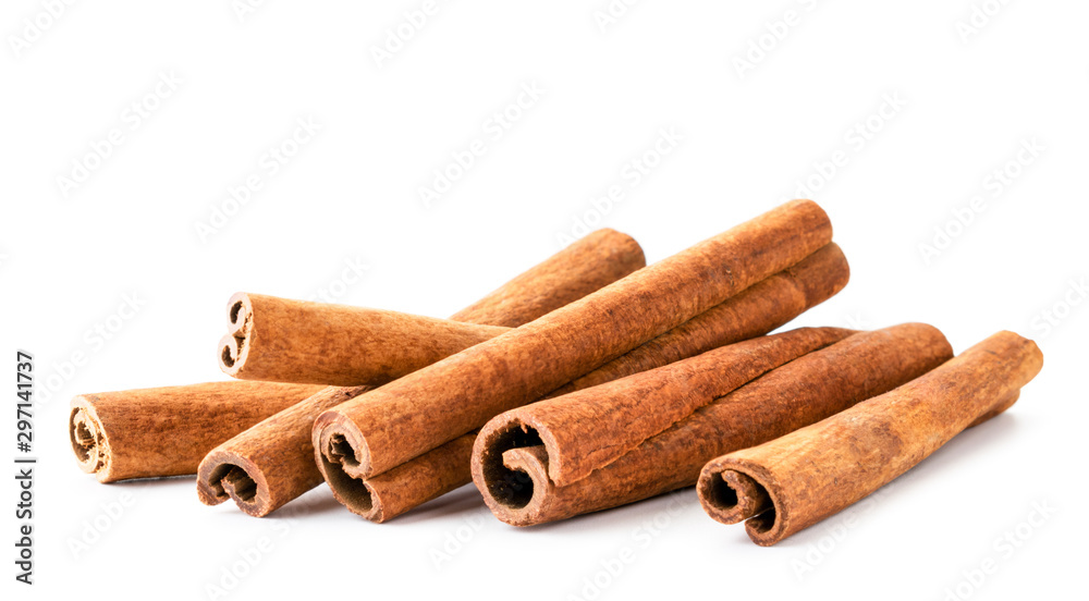 Pile of cinnamon sticks close up on a white. Isolated.