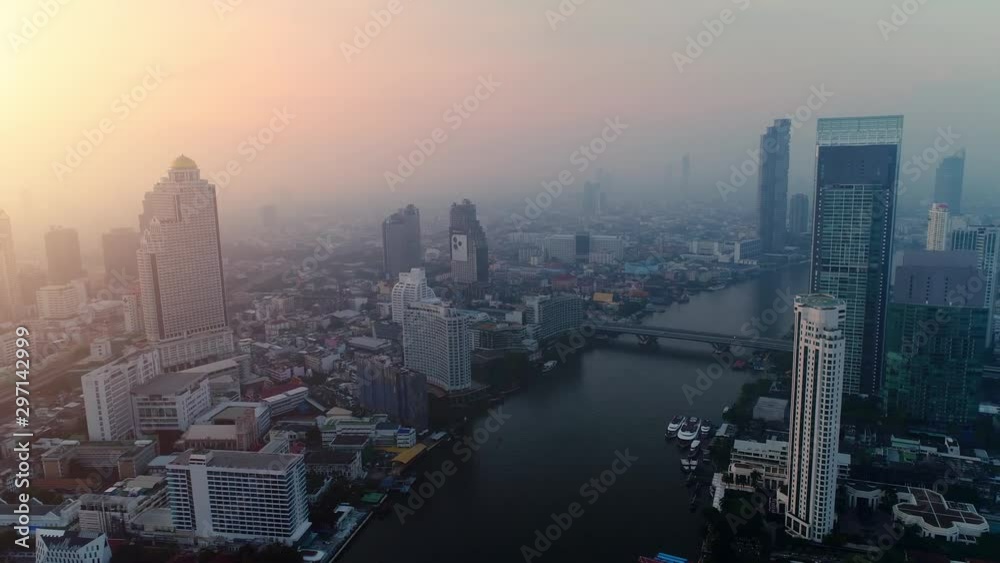 4K aerial drone footage of Bangkok skyline, Great sunset scene. Business city, view of Bangkok downtown, Flying over Bangkok, Thailand.