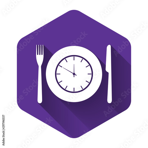 White Plate with clock, fork and knife icon isolated with long shadow. Lunch time. Eating, nutrition regime, meal time and diet concept. Purple hexagon button. Vector Illustration