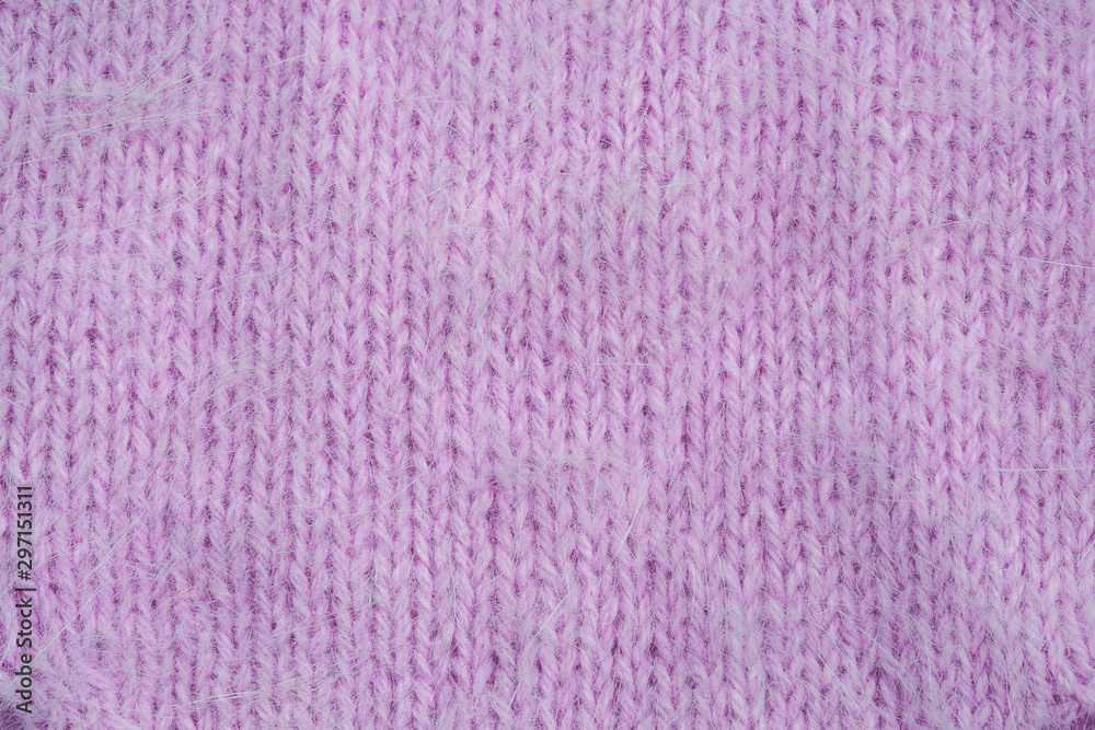 Knitted warm violet winter sweater. Huggy style. Top view, flat lay.Top view, flat lay. Knitted warm violet winter sweater. Huggy style. Top view, flat lay.Top view, flat lay.