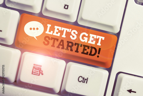 Obraz na płótnie Text sign showing Let S Get Started. Business photo showcasing encouraging someone to begin doing something White pc keyboard with empty note paper above white background key copy space w salonie