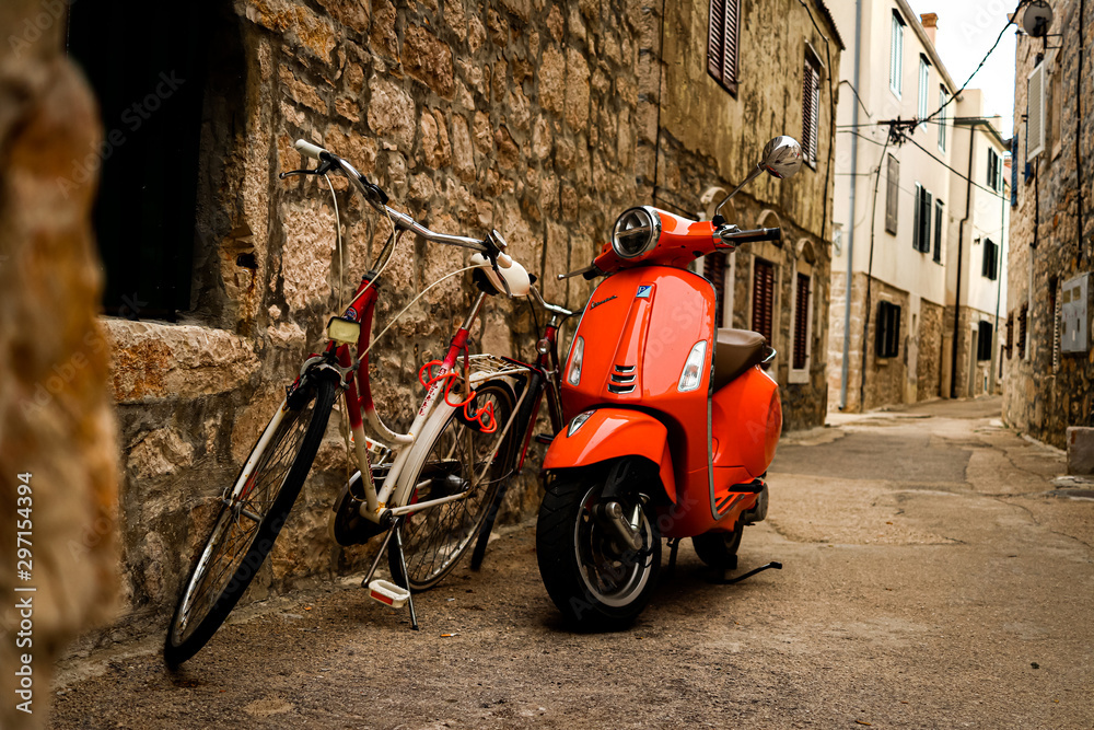 Vespa and bicycle in the Croatia street