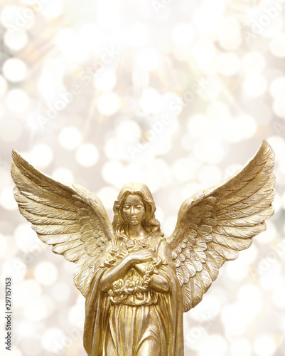 Golden shiny angle statue a...