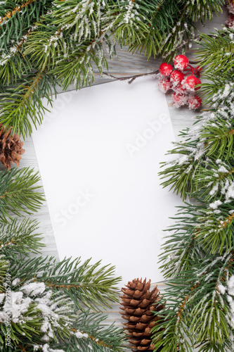 Christmas card and fir tree branch