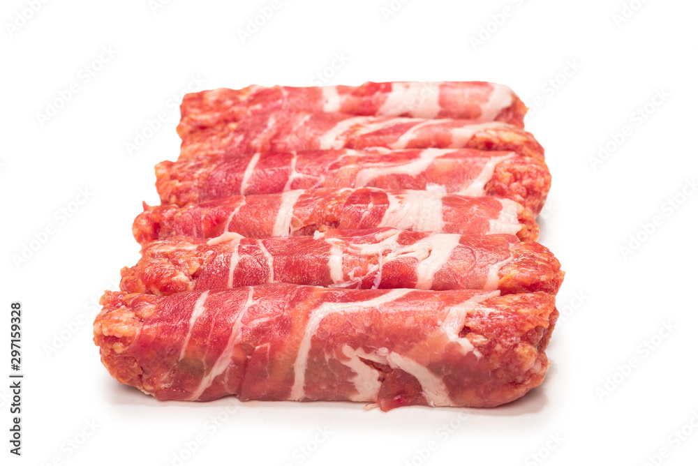 Chevapchichi in bacon isolated on white background. Chevapchichi in bacon isolated on white background.