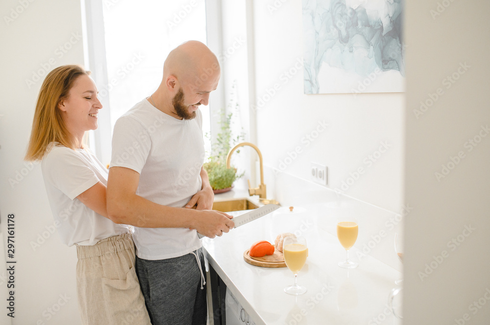 young couple making Breakfast in the morning. Young family. relationship 