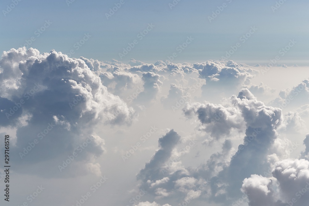 Naklejka premium Clouds seen from above in a plane flight