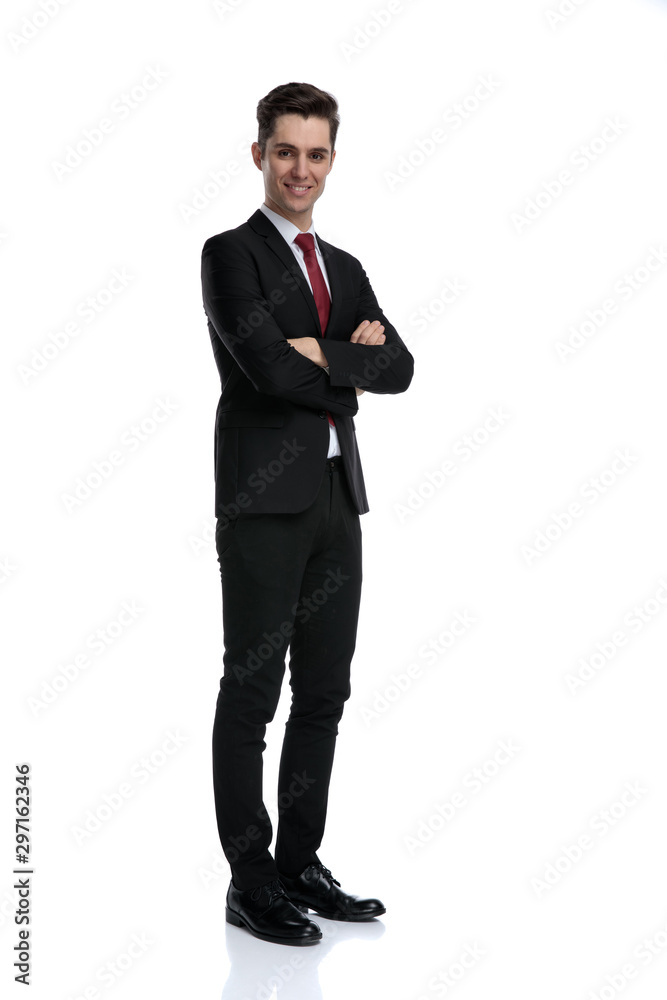 Positive businessman holding his hands folded